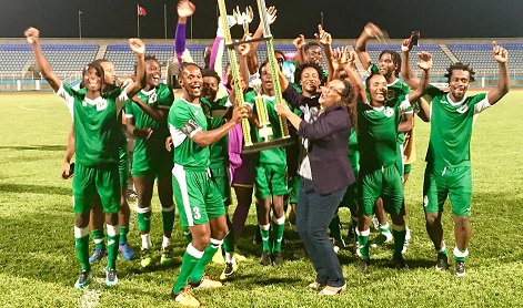 Photo: W Connection captain Gerard Williams, left, collects the Charity Shield 2018 trophy from TT Pro League CEO Julia Baptiste after defeating North East Stars 7-1 at Ato Boldon Stadium on 1 June, 2018.