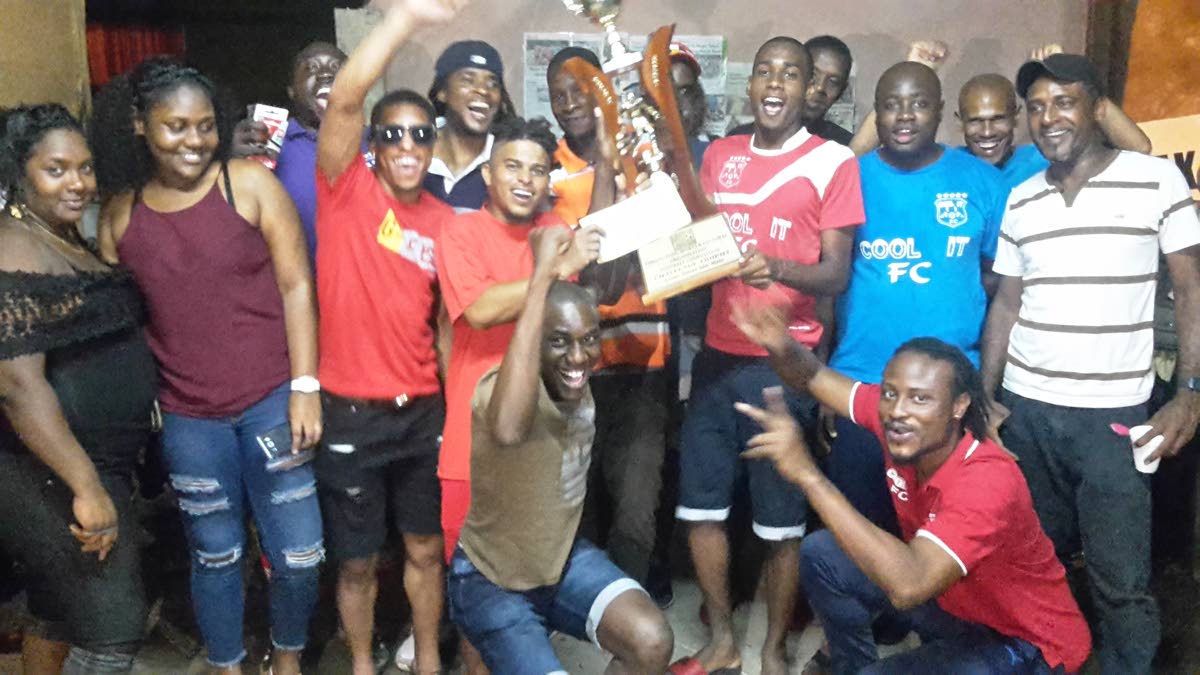 ‘Cool It’ players and supporters celebrate their victory on Saturday in the Caribbean Welders Fishing Pond ‘Big 8’ competition.