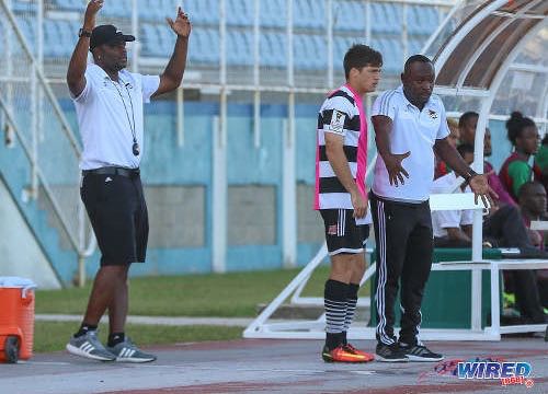 Photo: Central FC head coach Dale Saunders (right) gives instructions to substitute Sean De Silva (centre) while assistant coach Stern John gestures during Pro League action against San Juan Jabloteh at the Ato Boldon Stadium in Couva on 5 February 2017. ...(Courtesy Sean Morrison/Wired868)
