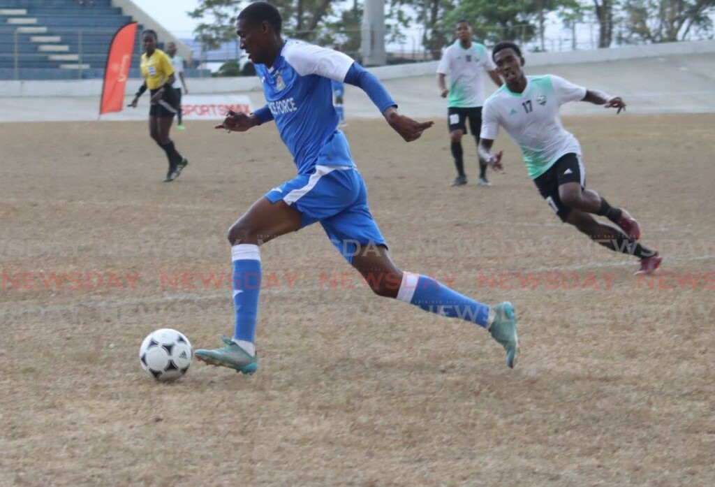 Defence Force's Hashim Arcia on the attack against Prisons FC on Saturday. - Roger Jacob