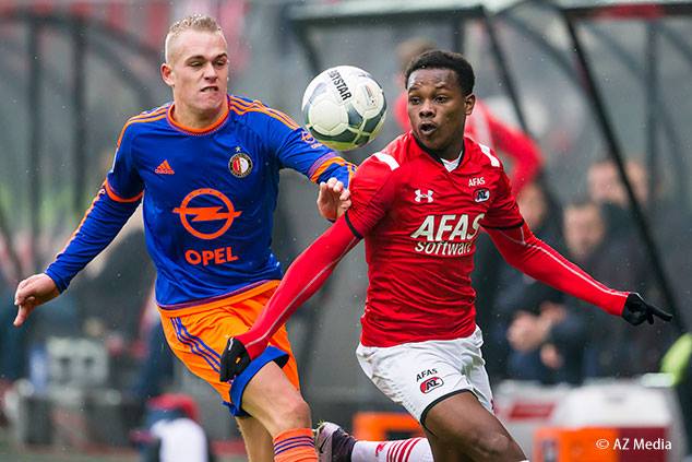 AZ Alkmaar’s Levi Garcia is challenged for the ball during a Dutch Eredivisie match against Feyenoord Rotterdam at AFAS Stadion, Alkmaar, Netherlands on Sunday, January 24th 2016