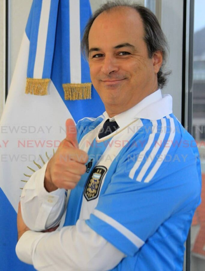 Argentina's Ambassador Marcelo Suarez Salvia with his national team's football jersey during an interview at his office on Marval Road, Port of Spain. - AYANNA KINSALE