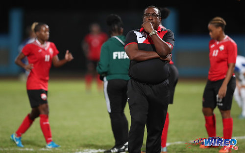 Photo: Trinidad and Tobago Women’s National Senior Team coach Jamaal Shabazz (centre) considers his option during international friendly action against Panama at the Ato Boldon Stadium on 22 March, 2018. (Copyright Allan V Crane/CA-Images/Wired868)