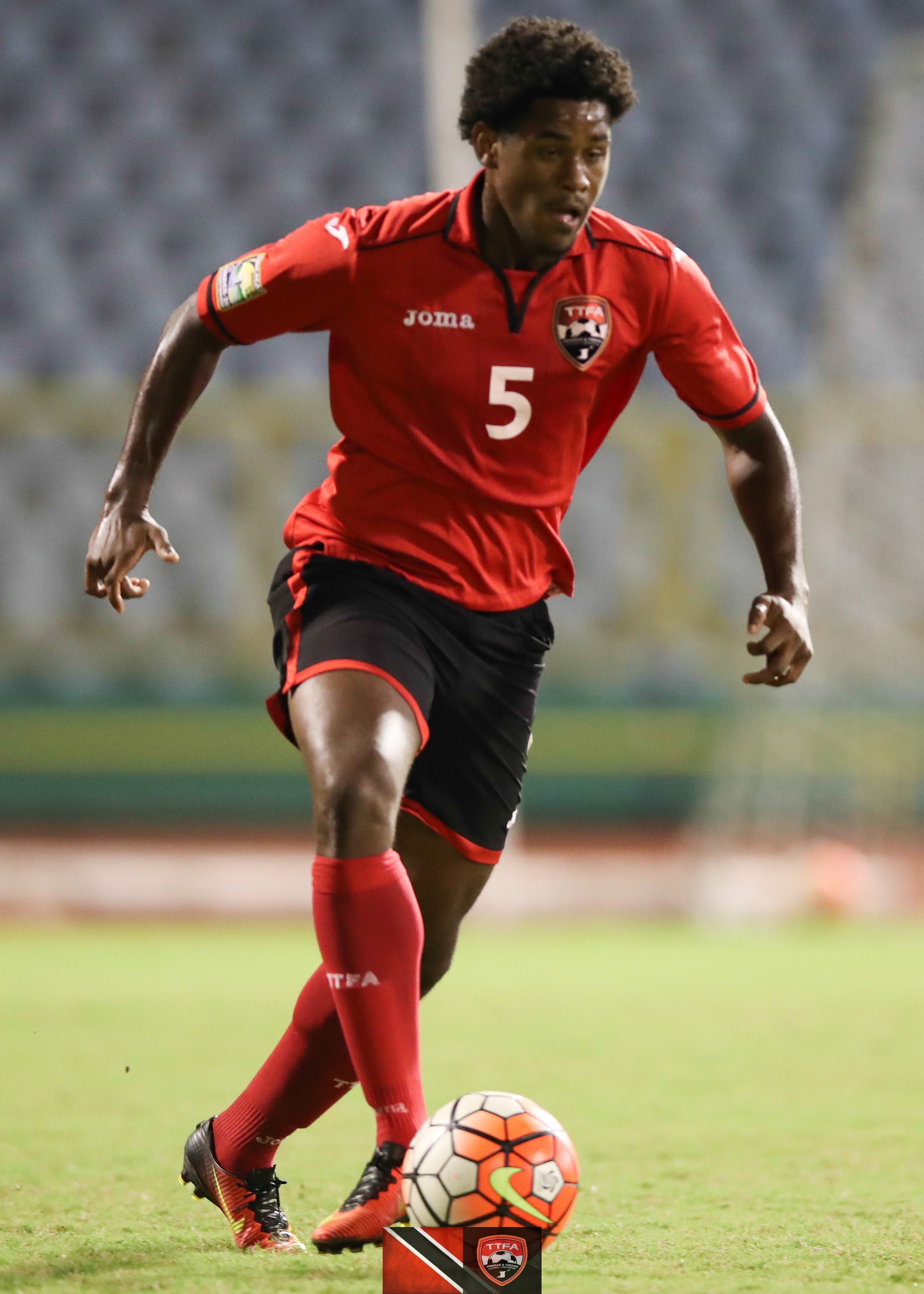 Ma Pau and T&T Under 20 defender Taryk Sampson.