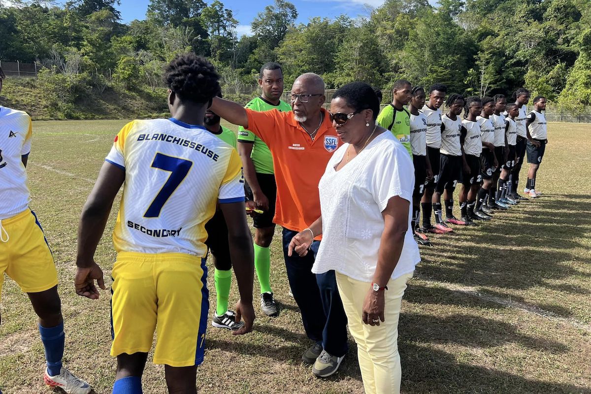 Minister of Planning and Development, Pennelope Beckles, meets the players from Blanchisseuse Secondary and Moruga Secondary schools before an SSFL Big Five match at La Fillette Village on Tuesday, February 20th 2024.