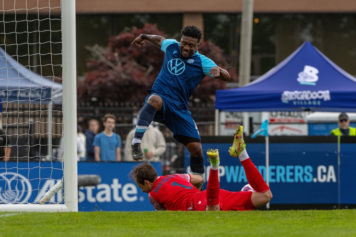 Akeem Garcia of the HFX Wanderers is denied by York United keeper Nikolaos Giantsopoulos during a Canadian Premier League match on June 4th 2022 in Halifax, Nova Scotia.