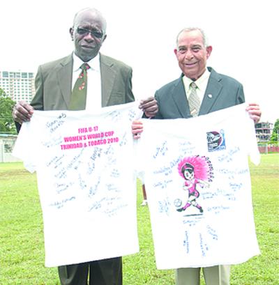 Jack Warner and Oliver Camps display Under 17 women world cup shirts.