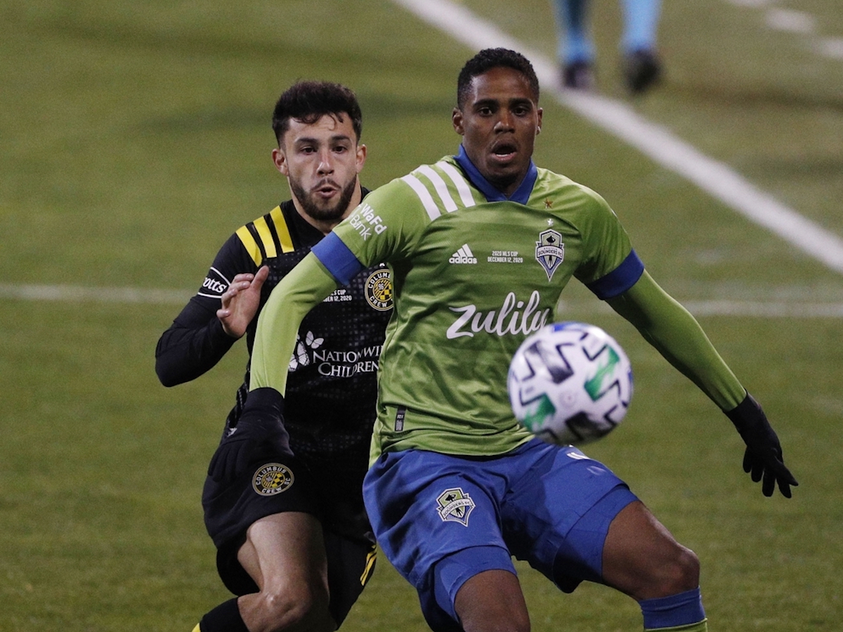 Dec 12, 2020; Columbus, Ohio, USA; Seattle Sounders defender Joevin Jones (33) battles for the ball with Columbus Crew defender Milton Valenzuela (19) in the first half during the 2020 MLS Cup Final at MAPFRE Stadium. Mandatory Credit: Trevor Ruszkowski-USA TODAY Sports