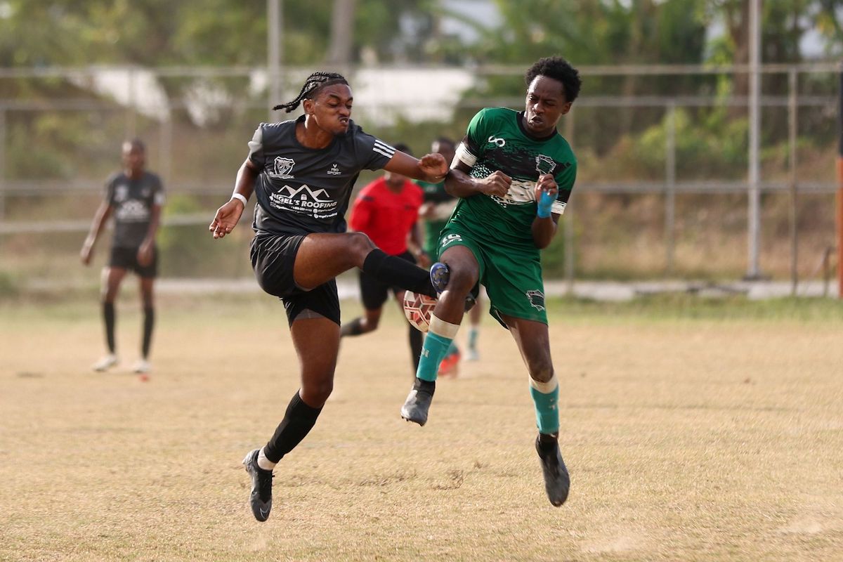 St Augustine’s Nkosi Fuentes, right, vie for possession with Miracle Ministries Pentecostal’s Jerrod Modeste during the SSFL Big 5 match at Edinburgh 500 Grounds on Friday, March 8th 2024 in Chaguanas. St Augustine Secondary won 3-0. PHOTO BY: Daniel Prentice