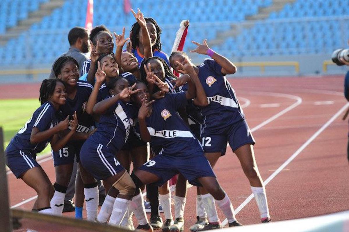The players of Pleasantville Secondary celebrate their victory in the Coca-Cola Girls InterCol final over Miracle Ministries Pentecostal High School at the Hasely Crawford Stadium, Mucurapo on Thursday, December 7th 2023. PHOTO BY: Jermaine Cruickshank