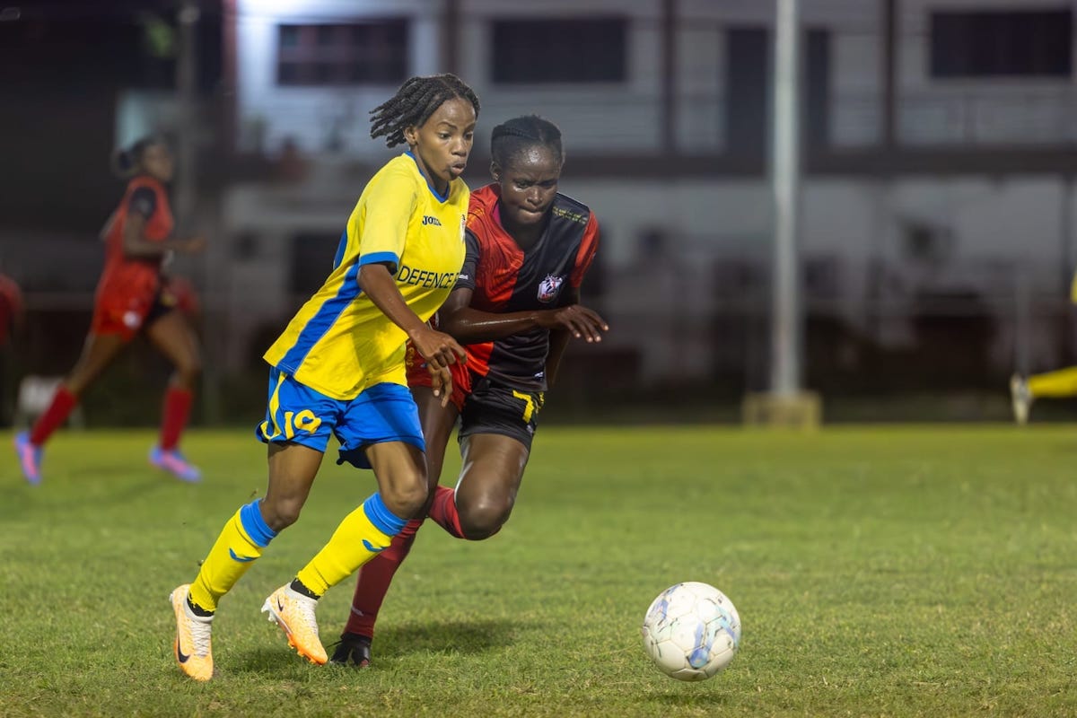 Defence Force's Aaliyah Prince (left) challenges an AC Port of Spain player for the ball during a match at the Hasely Crawford Stadium training field on Sunday, October 8th 2023.