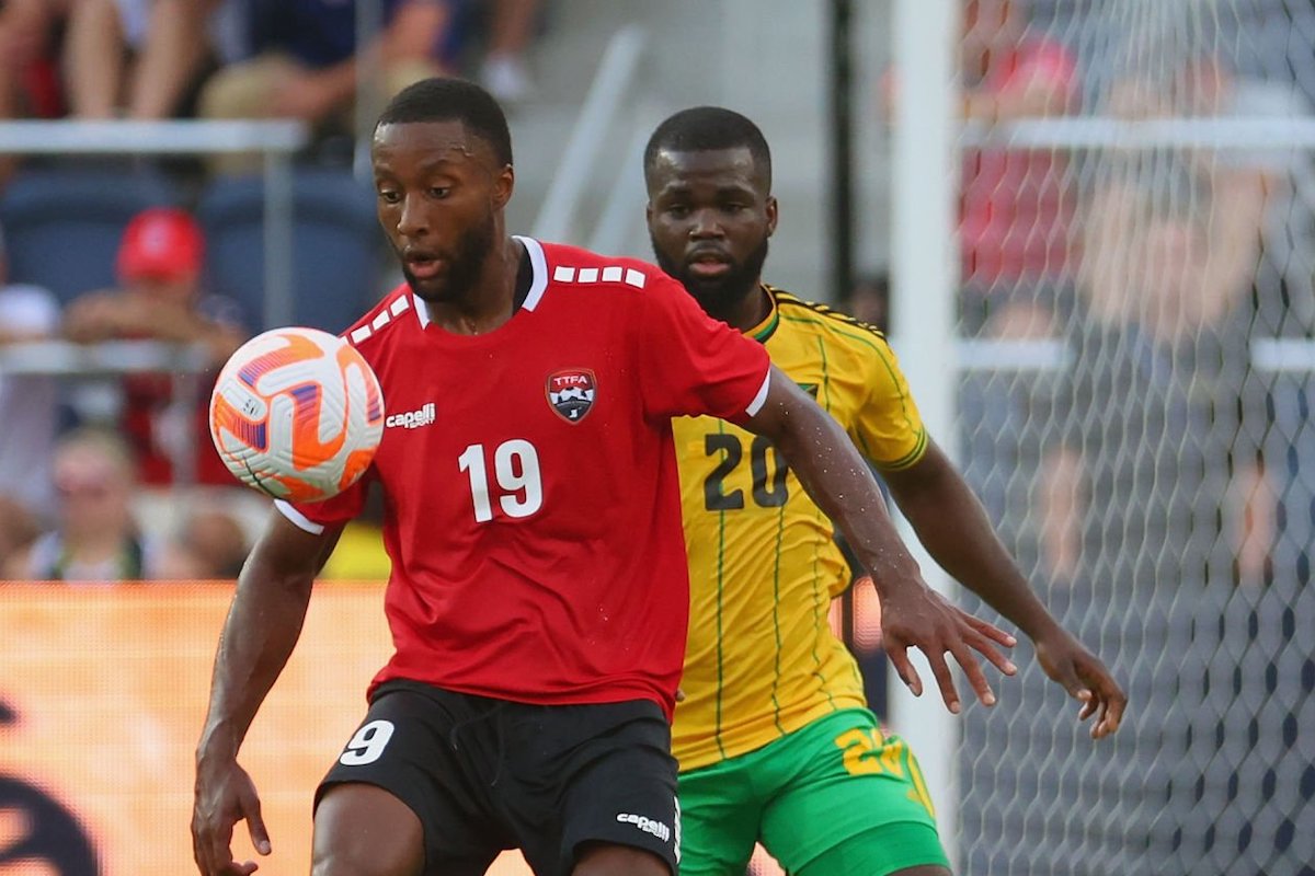 Malcolm Shaw #19 of Trinidad & Tobago beats Kemar Lawrence #20 of Jamaica to the ball in the first half during the 2023 Concacaf Gold Cup at Citypark on June 28, 2023 in St Louis, Missouri. (Photo by Dilip Vishwanat/Getty Images)