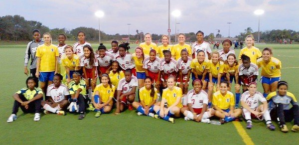 FAN FRIENDLY The Plantation Eagles girls' soccer program recently hosted the Under-17 Division women’s national team from Trinidad. (submitted photo / May 23, 2012) .