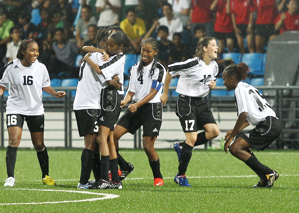 Trinidad & Tobago players celebrate at the end of the penalty shoot-out during the Papua New Guinea versus Trinidad & Tobago 5th-6th ranking match of the Singapore 2010 Youth Olympic Games (YOG) played at the Jalan Besar Stadium in Singapore, Aug 23, 2010. Trinidad & Tobago won 4-2 on penalty shoot-out. Photo: SPH-SYOGOC/Seyu Tzyy Wei