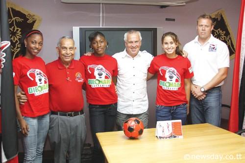 READY FOR WORLD CUP CHALLENGE: Trinidad and Tobago Football Federation (TTFF) president Oliver Camps (second from left) with national Under-17 players (left to right), defender and captain Camille Borneo, goalkeeper Keri Myers, coach Even Pellerud, defender Lauren Schmidt and goalkeeper coach Marius Rovde at yesterday's media conference. ...Author: ROGER JACOB