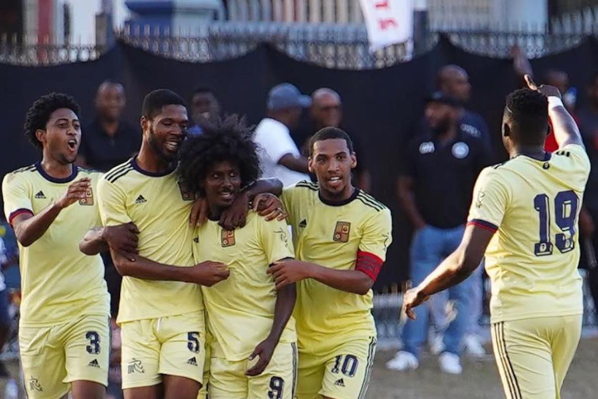 Cunupia FC's Romario Williams is congratulated by his teammates after scoring the equalizer in a 1-1 draw with W Connection at Arima Velodrome on May 3rd 2023.