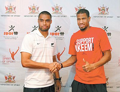 New Zealand skipper and West Ham United defender, Winston Reid, left, shakes hands with T&T defender Radanfah Abu Bakr during a pre-match media conference, held at Trotters Bar and Grill, Maraval Road, yesterday. The two teams will clash in an international friendly at the Hasely Crawford Stadium, Mucurapo, from 7.15 pm this evening. Photo: Brian Ng Fatt.