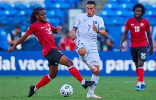 Photo: Trinidad and Tobago midfielder Duane Muckette (left) challenges El Salvador midfielder Darwin Ceren for the ball during Gold Cup action at the Toyota Stadium in Frisco on 14 July 2021. (Copyright Concacaf)