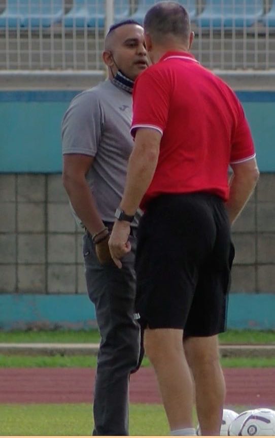National head coach Terry Fenwick, left, and TTFA Media Director Shaun Fuentes during yesterday’s alleged altercation at the Ato Boldon Stadium in Balmain, Couva, before the Press Conference. ...Photo: Ignatius Wharton