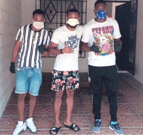 T&T footballers Jomoul Francois, left, Jomal Williams, centre, and Jamal Jack all of whom are based in El Salvador pose after arrangements were made for them to be housed together and provided with relief stuff until they can come home.