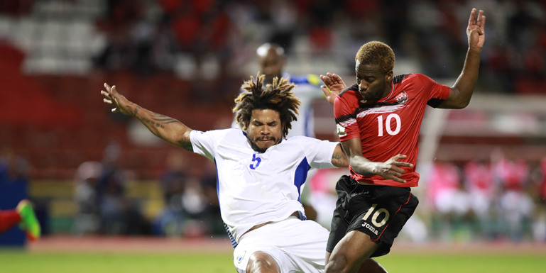 Trinidad & Tobago's Kevin Molino (#10) attempts a shot against visiting Panama in a World Cup qualifier on March 24, 2017, in Port of Spain. (Photo: CA-Images)