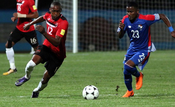 T&T’s Reon Moore,left, and Panama’s Sergio Ortega vie for the ball during an international friendly, on Tuesday, at the Ato Boldon Stadium. Panama won 1-0. PHOTO BY ANSEL JEBODH