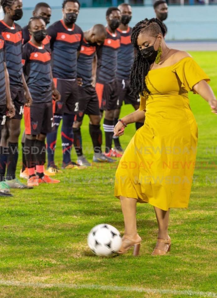 This this August 1, 2020 file photo, Sports Minister Shamfa Cudjoe kicks the ball ahead of an exhibition game between Bethel United FC and Canaan 1976 FC Phoenix at the newly reopened Dwight Yorke Stadium in Bacolet. - DAVID REID