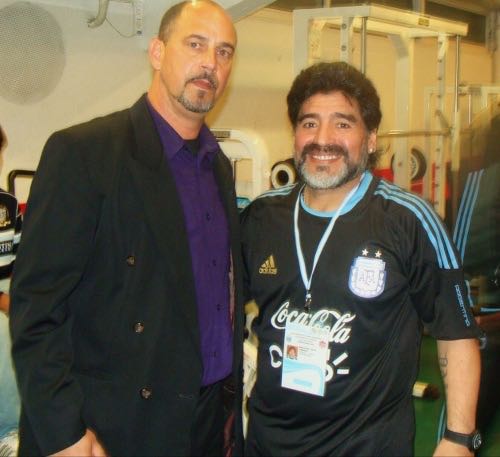 Photo: Then Canada head coach Stephen Hart (right) poses with Argentina coach Diego Maradona after an international friendly on 24 May 2010. Argentina won 5-0 against an under-strength Canada team.