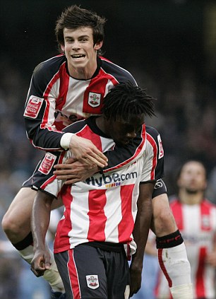 Killer touch: Jones celebrates after scoring against Sheffield Wednesday for Southampton (right) and with rising star Gareth Bale (left) while at St Mary's