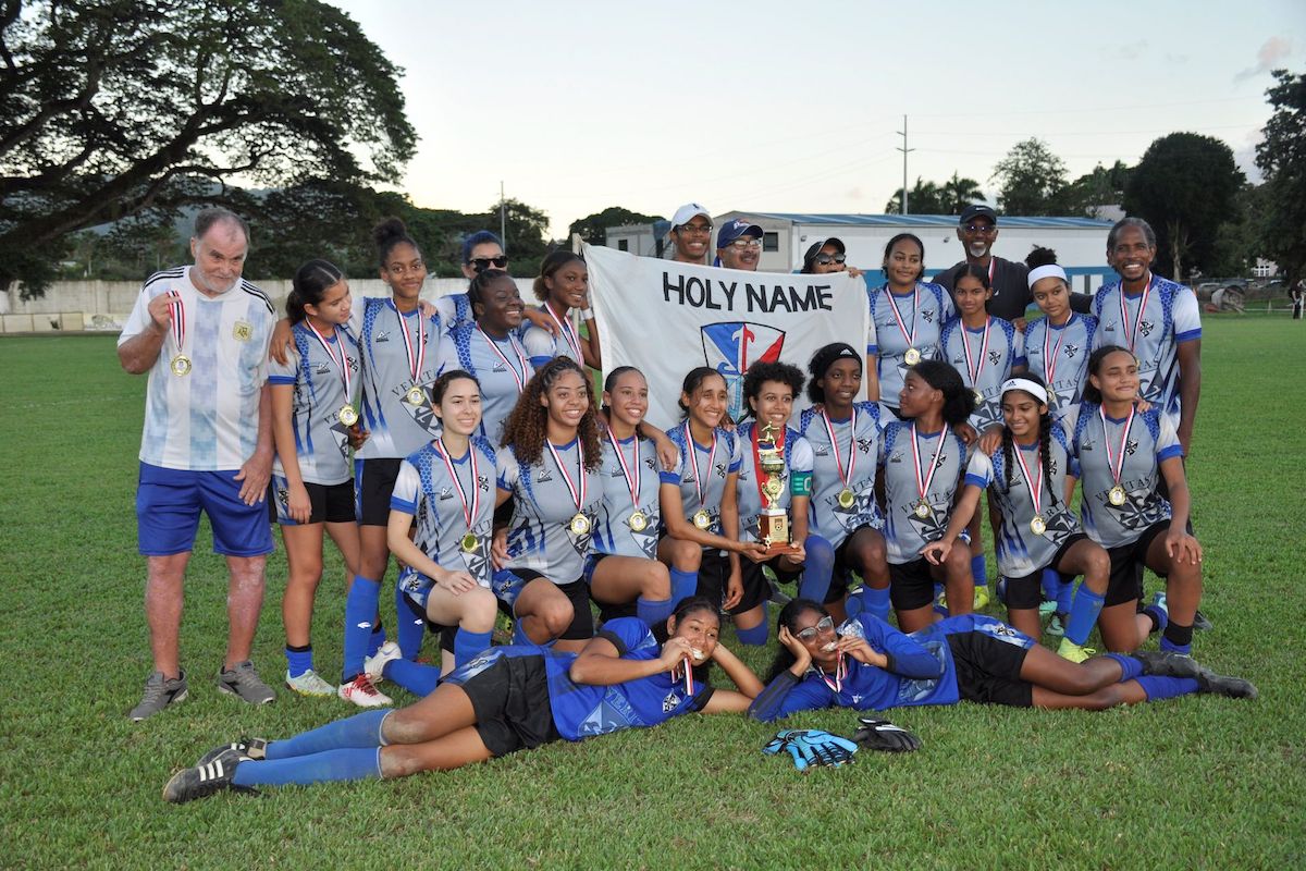 NORTH INTERCOL QUEEN’S Members of Holy Name Convent, Port-of-Spain, celebrate the 2022 Tiger Tanks North Zone Girls Intercol title after they defeated St Joseph’s Convent, Port-of-Spain, 3-1 at the St Mary’s Grounds, St Clair, Port-of-Spain on Wednesday November 30th 2022. PHOTO: Ronald Daniel