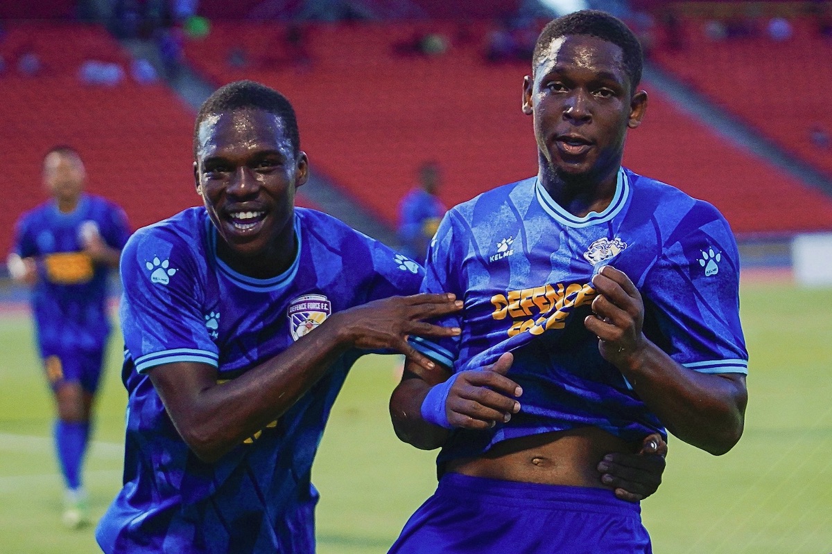 Defence Force's Isaiah Leacock (right) celebrates with a teammate after scoring a goal against Central FC in a First Citizens Cup semifinal at the Hasely Crawford Stadium, Mucurapo on Thursday, May 23rd 2024.