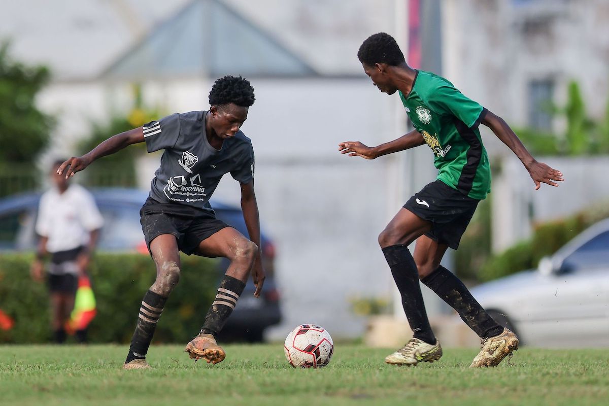 Miracle Ministries’ Kyle Holder, left, takes on Carapichaima East Zephan Charles during the SSFL Central Zone Intercol semifinal match at Edinburgh 500 ground in Chaguanas on Tuesday, November 14th 2023. Miracle won 3-0. PHOTO BY: Daniel Prentice