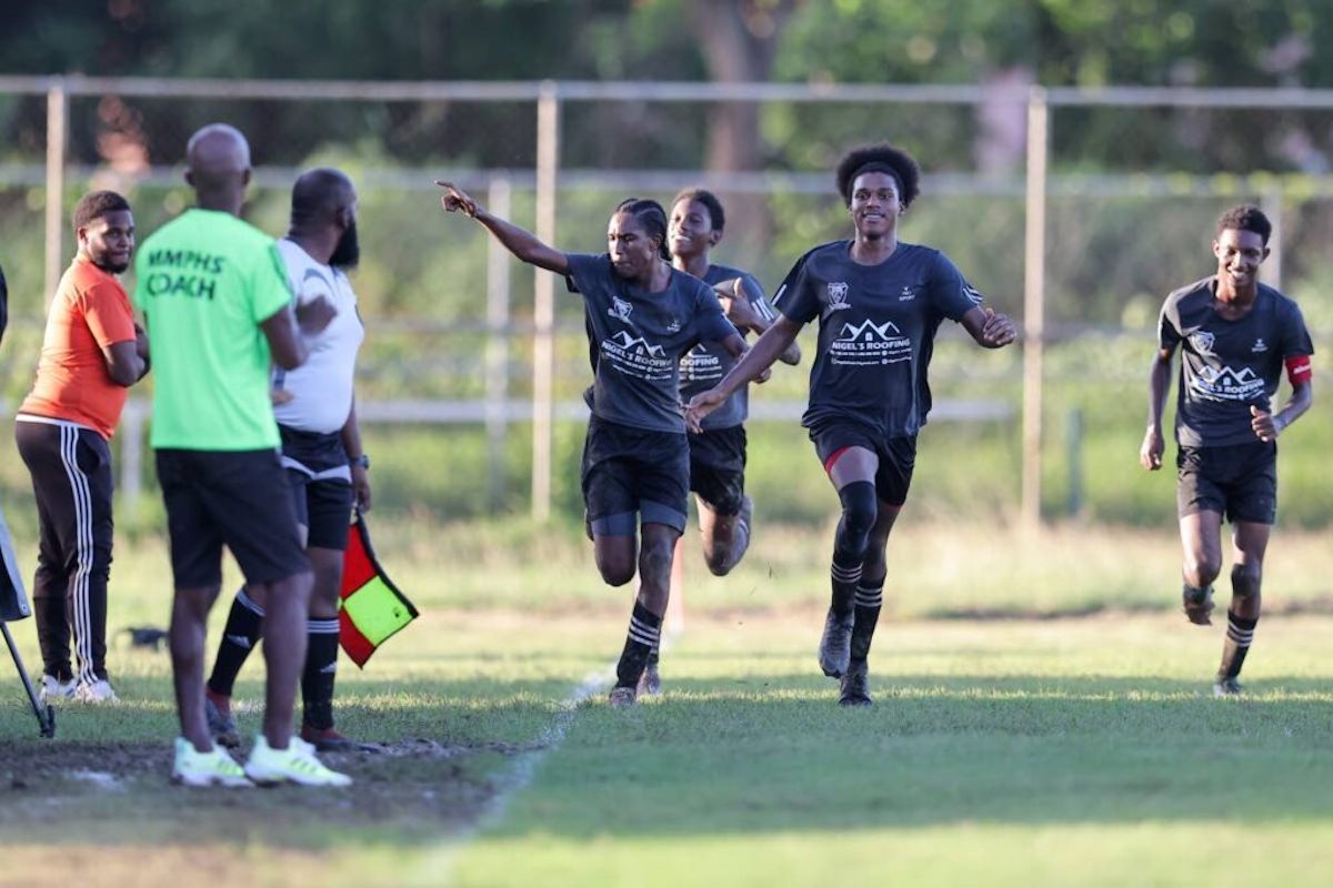 Miracle Ministries’ Jabari Rodriguez, second from right, celebrates his goal against Carapichaima East Secondary in the SSFL Central Zone Intercol semifinal at Edinburgh 500 ground on November 14th 2023, in Chaguanas. PHOTO BY: Daniel Prentice