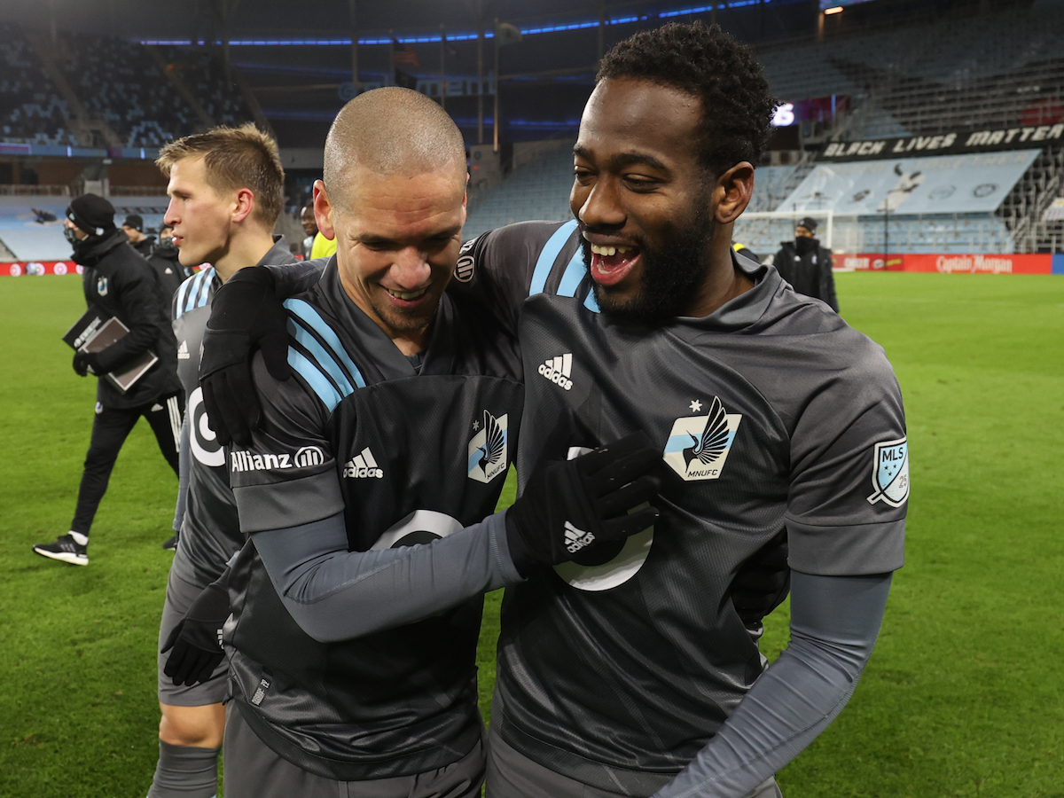 Kevin Molino (right) and Osvaldo Alonso (left) celebrate Minnesota United's 3-0 victory over Colorado Rapids on November 22nd 2020