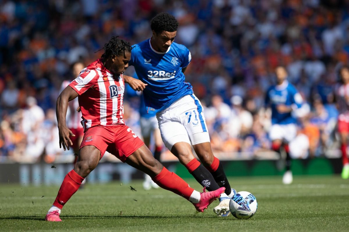 St Johnstone's Daniel Phillips (left) and Rangers' Malik Tillman (right) battle for the ball during a Scottish Premier League match at Ibrox Stadium, Glasgow, Scotland on Saturday, August 13th 2022.