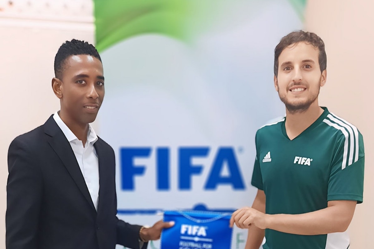 TTFA Vice President Jameson Rogues (left) and Fifa Football for Schools manager Antonio Buenano Sanchez (right).