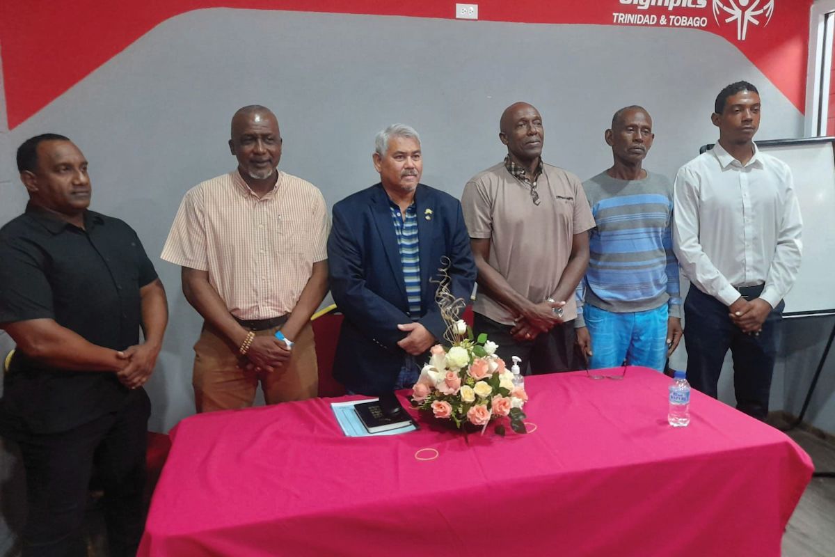 New SFA president Dennis Latiff, third from left, is flanked by members of his executive—from left, Joseph Rooplal, the Public Relations Officer, Aldwyn Ferguson Jr, asst VP, Michael Maurice, the General Secretary—Administration, Clayton Williams, the Secretary—Operations and Dwight De Leon, who was newly appointed general secretary. PHOTO: Keith Clement