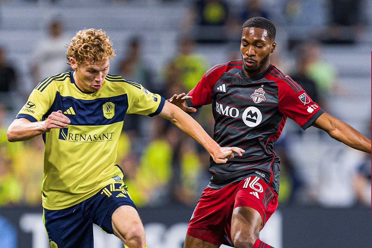 Nashville SC's Jacob Shaffelburg (left) and Toronto FC's Tyrese Spicer (right) battle for the ball during a match at Geodis Park, Nashville, TN on Wednesday, May 15th 2024. PHOTO BY: Lukas Kschischang
