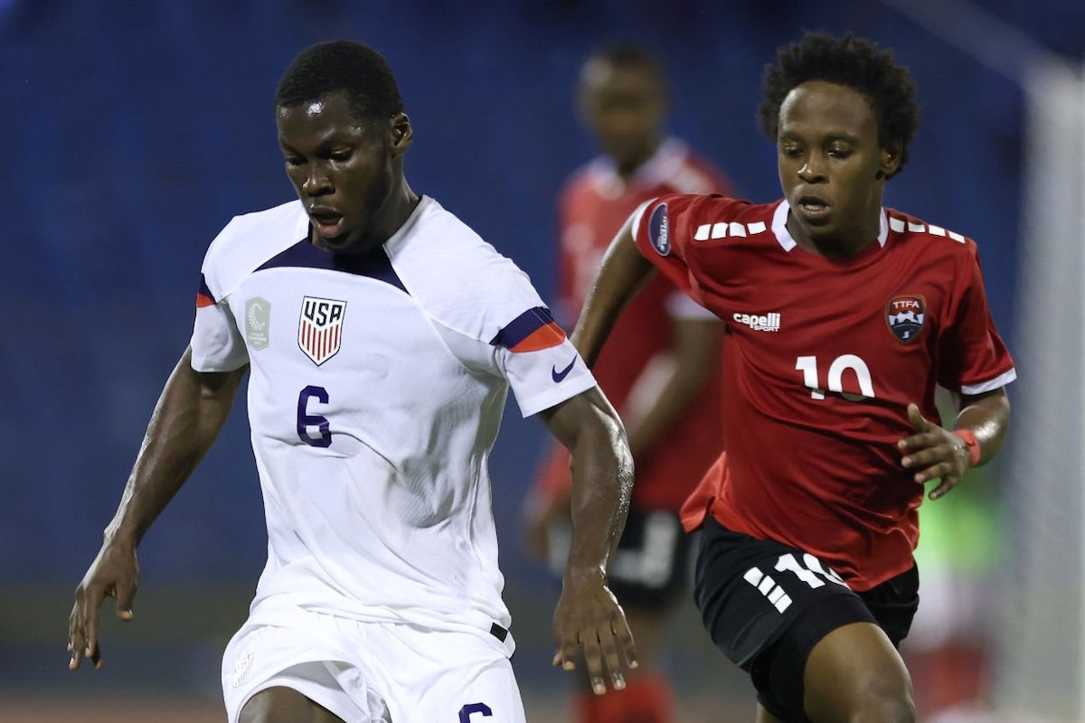Yunus Musah #6 of the United States is marked by Real Gill #10 of Trinidad and Tobago during the first half at Hasely Crawford Stadium on November 20, 2023 in Port of Spain, Trinidad And Tobago. (Photo by John Dorton/ISI Photos/USSF/Getty Images for USSF)