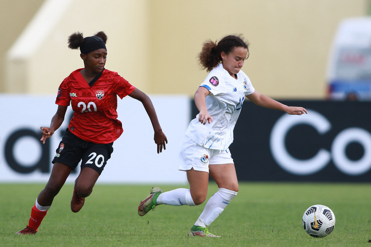 Trinidad and Tobago's Jada Graham (left) chases the ball during a Concacaf Women's U-17 Championship match against Panama on Saturday, April 23rd at Estadio Olímpico Félix Sánchez, Santo Domingo, Dominican Republic.