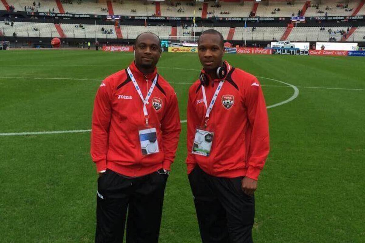 Trinidad and Tobago's Gavin Hoyte (right) and brother Justin Hoyte (left) pose for a photo at the Estadio Monumental, Buenos Aires before facing Argentina in a friendly match on June 4th, 2014.