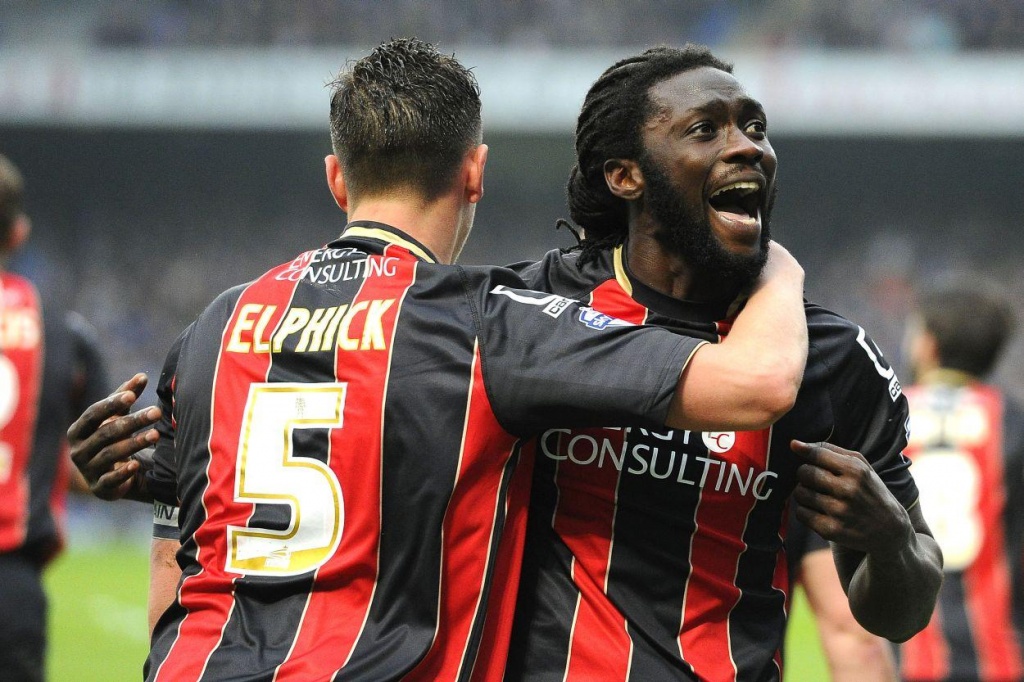 Kenwyne Jones celebrates with teammates after scoring AFC Bournemouth’s equalizer during an English Championship match against Ipswich Town at Portman Road, Ipswich, England on Friday, April 3rd 2015.