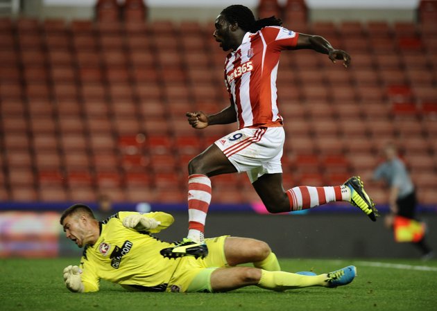 Stoke City's Kenwyne Jones completes his hat trick during the Capital One Cup, Second Round match against Walsall at the Britannia Stadium, Stoke