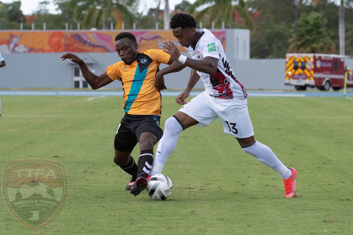 Trinidad and Tobago defender Keston Julien (right) battles for the ball during a 2022 FIFA World Cup Qualifier against Bahamas at the Thomas A. Robinson Stadium, Nassau, Bahamas, on June 5th 2021.