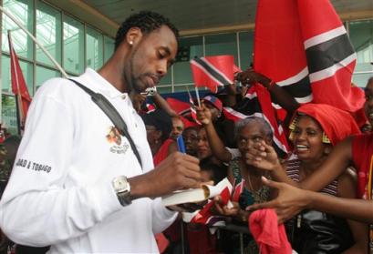Heroes welcome for Dennis after he scored the goal vs Bahrian that took T&T to its first ever World Cup.