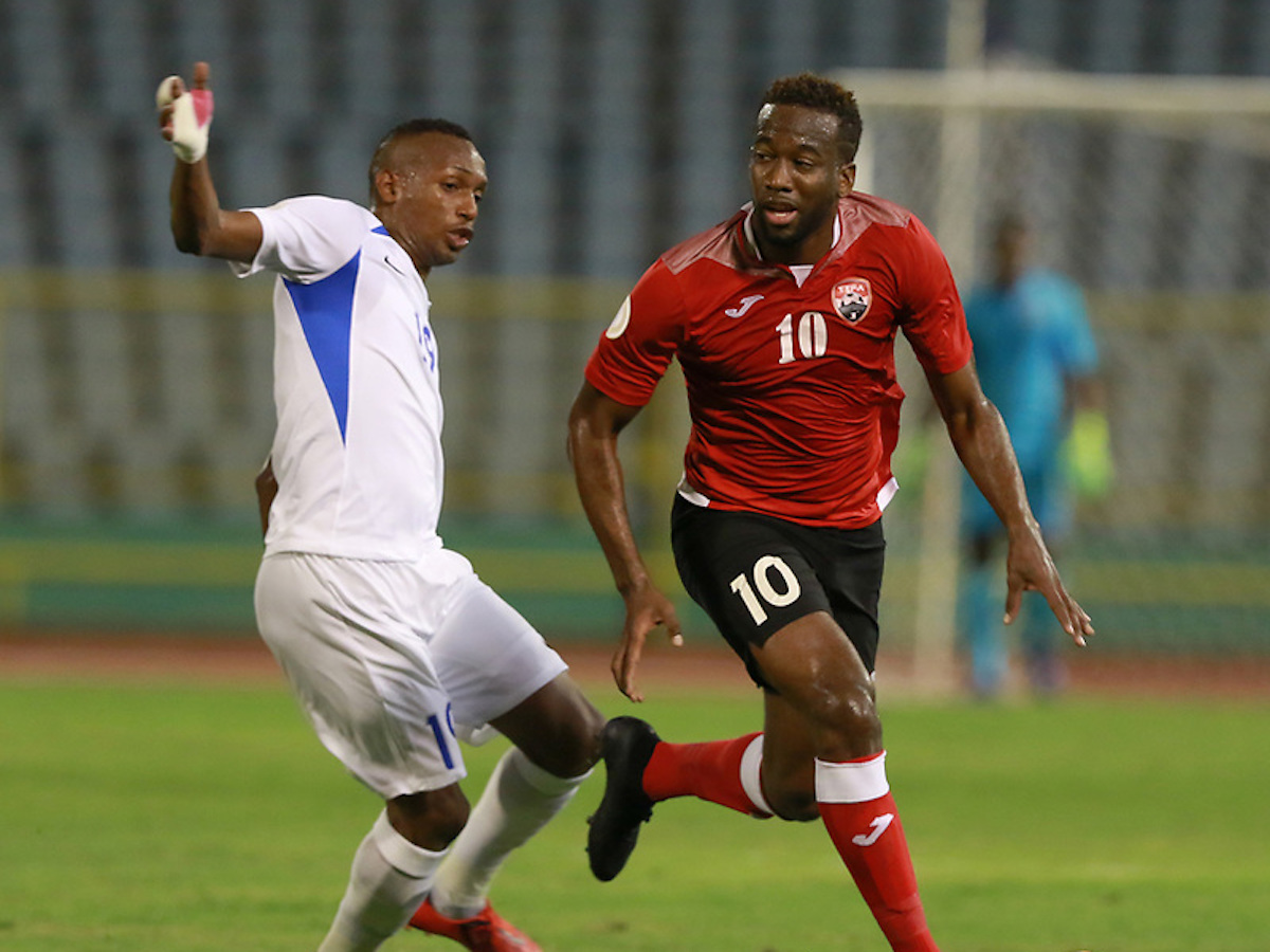 2019.09.10: Kevin Molino,right,tries to escape a Martinique player during the Concacaf Nations League match between Trinidad & Tobago and Martinique at the Hasely Crawford Stadium,Port of Spain.Image:Nicholas Bhajan/CA-images