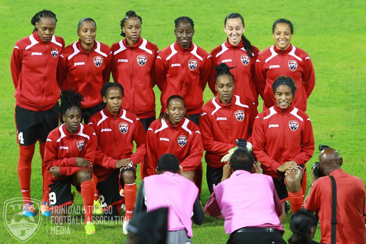 Trinidad and Tobago Women's starting XI pose for a team photo before facing Ecuador in in the second leg of a 2015 FIFA Women's World Cup Qualifying playoffs at Hasely Crawford Stadium on December 2nd 2014.