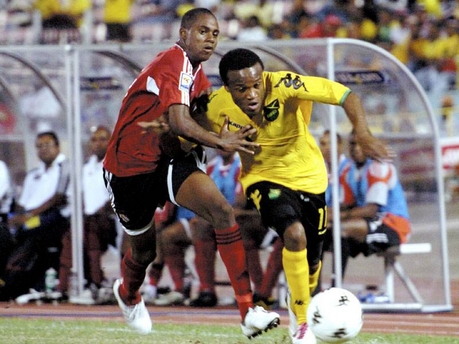 T&T youngster Jovin Jones man marking Dane Richards. (PHOTO CREDIT: - Jamaica Gleaner).