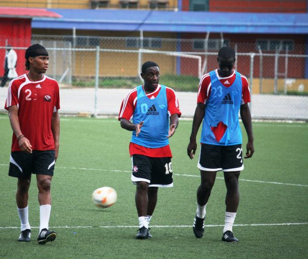 T&T player and assistant coach of the Senior Men's Football Team Russell Latapy talks to players Trent Lougheed (left) and Uriah Bentick (right) as they prepare for Saturday's opening 2009 CONCACAF World Championship qualifier against Canada at the Marvin Lee Stadium at 6pm. Photo courtesy TTFF media.